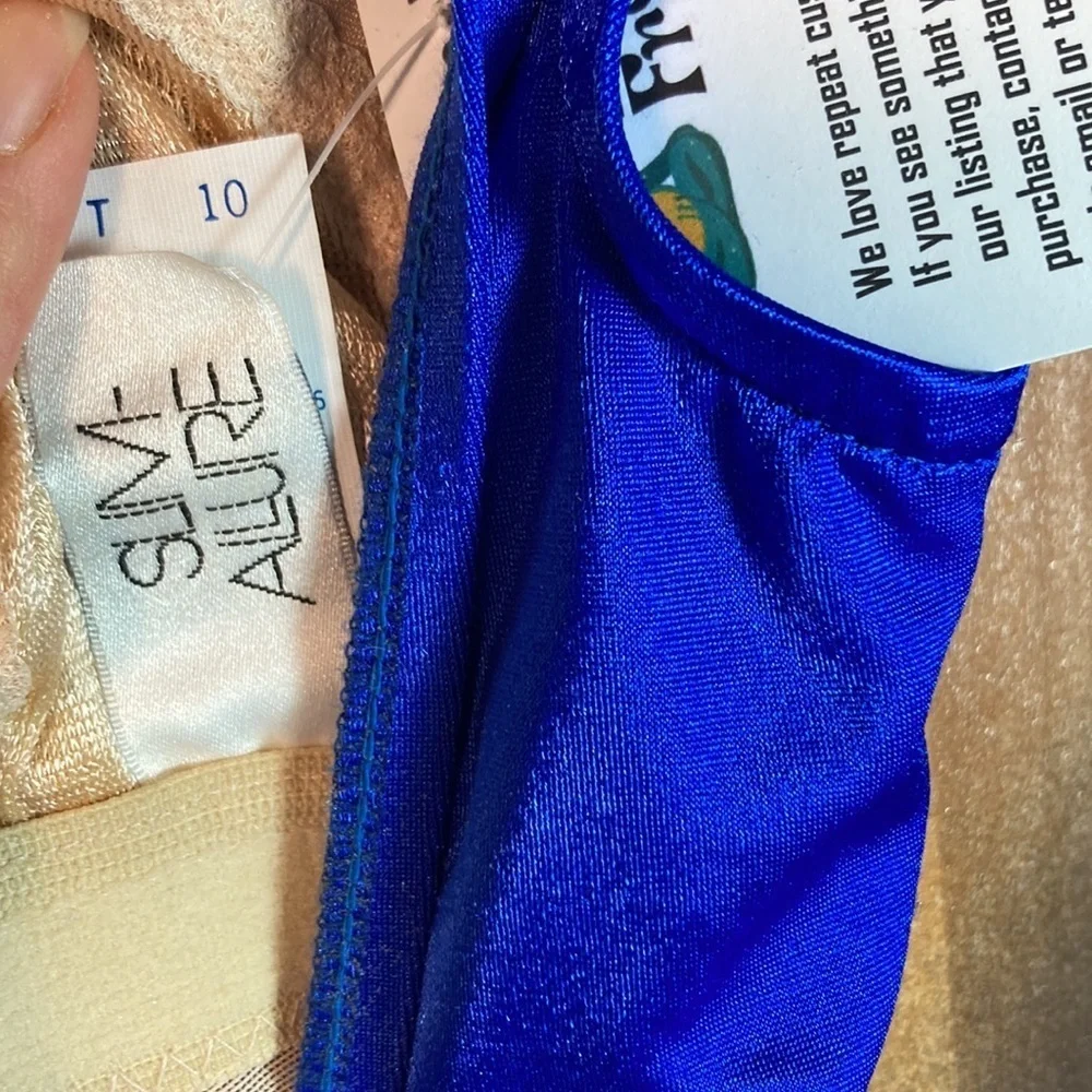 VINTAGE 80’ bright blue and turquoise swim suit. High cut 159 32” chest‎ small